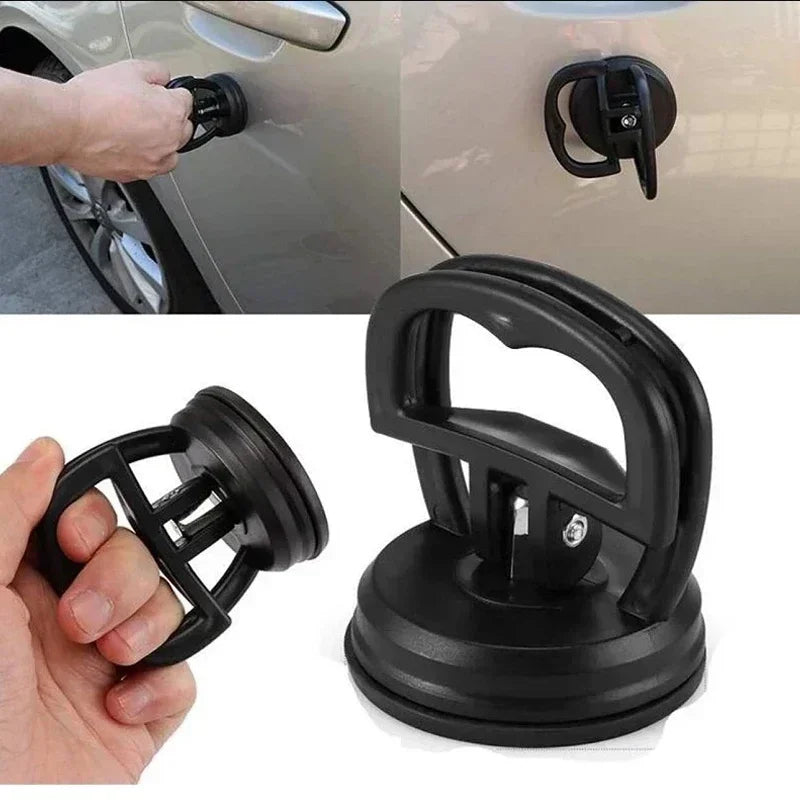 Desamassador de carro sendo usado para reparar amassados em várias partes da lataria